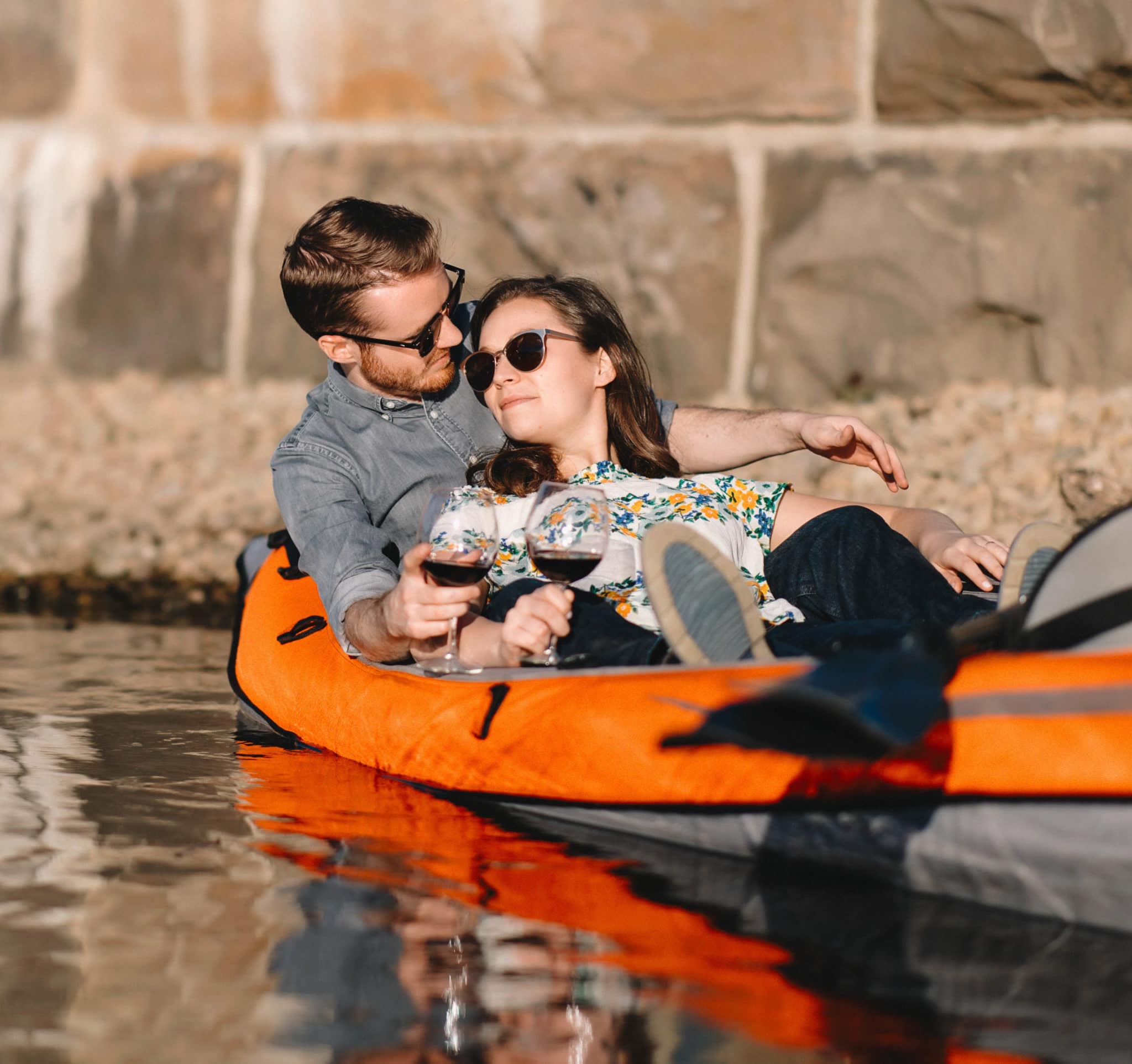 engagement photo of couple on kayak